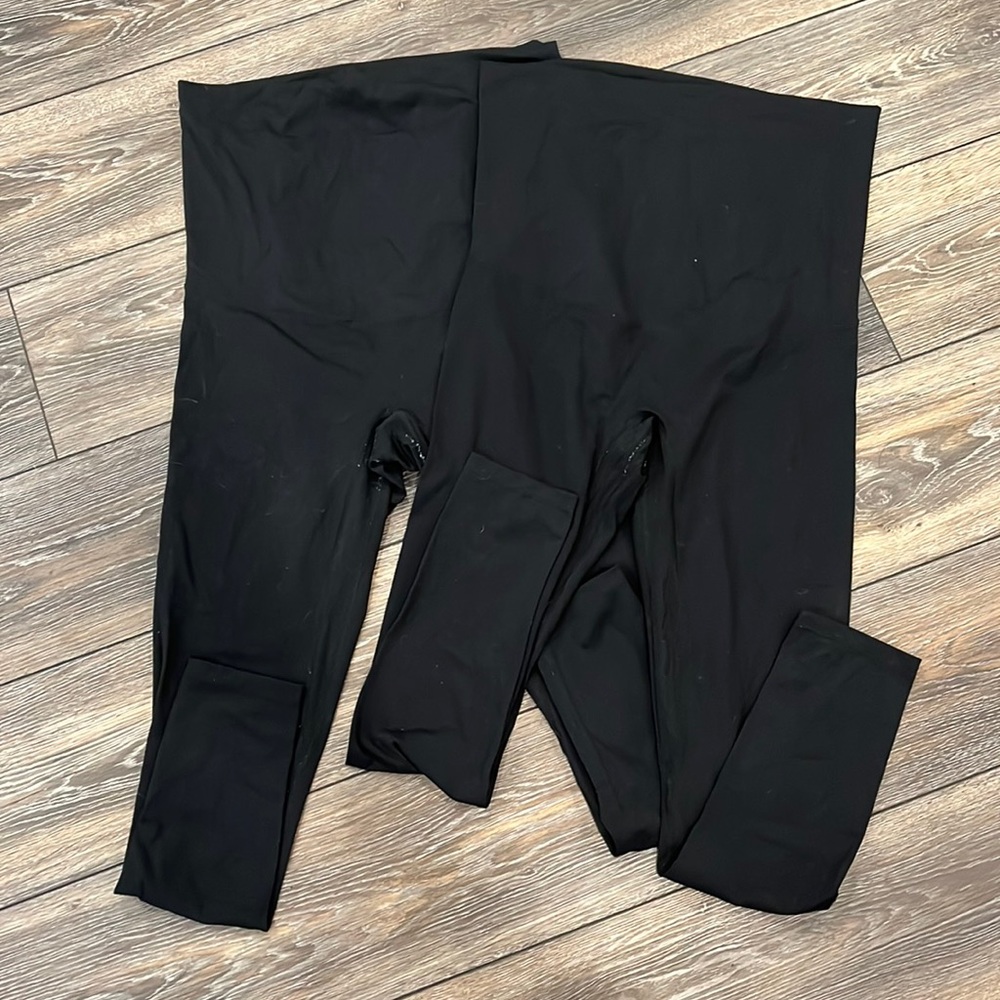 Two pairs of maternity leggings.